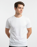 Man wearing a white t-shirt against a plain background